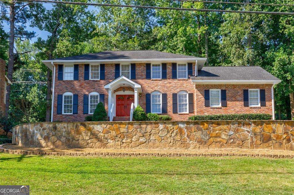 BEST PRICE & Fantastic Opportunity to Live in Top-Rated Austin Elementary School District! Walking Distance to Austin ES and Dunwoody Nature Center, this Home is Move-In Ready and Nicely Upgraded and Renovated Throughout with a Fabulous Level Backyard! Newer Kitchen with New Wood Cabinetry, Stainless-Steel Appliances and Granite Offers Great Space to Cook/Entertain + a Desk Area and Sunny Breakfast Area. Bright Fireside Family Room Features a Bay Window & Walkout Access to the Large Level Private Backyard and Patio! Beautiful Separate Dining Room & Living Room/Office on the Main Level long with Fresh Paint, Hardwood Flooring + Recessed Lighting! Upstairs the Spacious Primary Suite Offers a Walk-In Closet with Renovated Bathroom! Versatile Finished Basement for Entertainment, Play & Exercise Along a Clean Dry Storage Space! The Front Yard Has Been Landscaped with a Beautiful Stone Retaining Wall. This Home has Access to a Quiet and Peaceful Trail Leading Directly to Dunwoody Nature Center and Austin! Just a Few Minutes from Dunwoody Village, Shopping/Dining & GA400 - Plus Option to Join Very Popular Mill Glen Swim/Tennis Club!
