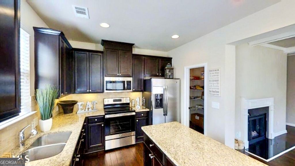 Photo of 2816 Ellis Pointe Avenue #50, Conyers, GA 30094 (MLS # 10656702)