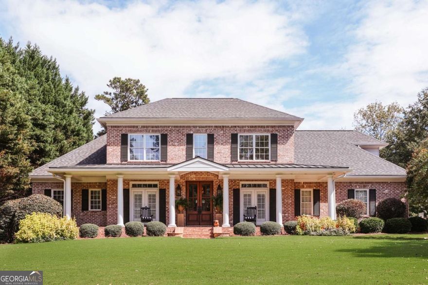 Experience the perfect blend of comfort, style, and outdoor enjoyment in this beautifully updated home. Thoughtfully designed for today's lifestyle, the interior of the home is thoughtfully updated and ideal for today's living while the backyard is simply beyond compare. It welcomes you with lush fresh sod, extensive landscaping, and a resort-like feel- ideal for entertaining or relaxing. Your own private oasis, it is fully fenced and features a custom bluestone patio, manicured garden beds, and a professionally installed putting green-perfect for casual play or sharpening your short game. Whether hosting gatherings under the stars or enjoying quiet mornings surrounded by nature, every detail of the outdoor space invites you to linger.    Inside, you'll find elegant updates throughout, blending modern finishes with timeless character. Updated kitchen and fresh lighting package,Plantation shutters, hardwood floors, gas logs, 2 newer HVAC units, New Roof March 2025, Walk out attic storage. Irrigation front and back. This gracious home truly offers the best of both worlds-refined interiors and inspired outdoor living.