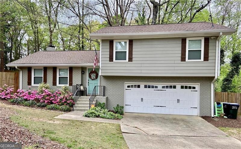 Welcome to 270 Mansell Circle, a delightful 3-bedroom, 2-bathroom home with a two-car garage located on a quiet cul-de-sac. Step inside to find a comfortable floor plan with engineered hardwoods throughout main floor. The living spaces have an easy flow, creating a warm and inviting atmosphere with a wood burning fireplace. The kitchen has stone countertops and 2024 dishwasher and 2024 built-in microwave. The spacious primary bedroom has a walk-in closet, ensuite bathroom and recessed lighting creating the perfect oasis. There are two secondary bedrooms and a full guest bathroom that provide flexibility for families, roommates, or guests. Water Heater is brand new, roof is only 6 yrs old, gutter guards were installed 2 yrs ago and windows are newer. Located just moments from historic Downtown Roswell, this property offers unbeatable access to award-winning restaurants, boutique shops, vibrant nightlife, and the Chattahoochee River trails. Whether you're searching for a primary residence or a turnkey investment opportunity, this home checks all the boxes. With its prime location, strong rental potential, and classic appeal, it's a rare find in one of Roswell's most desirable areas. Don't miss your chance to own this Roswell treasure-schedule a showing today! *Pictures are from when the previous occupants lived there. Home is now vacant without staging.