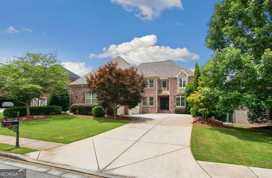 Welcome to 1833 Lake Ebenezer Trail N-where lakefront luxury meets inspired custom living in one of East Cobb's most sought-after communities. Perfectly positioned on the water in Ebenezer Farm, this stunning 5-bedroom, 4.5-bath executive home is a rare opportunity to own a thoughtfully upgraded retreat that feels like a private resort. From the moment you step inside, you're greeted by soaring ceilings, fresh paint, and newly installed smart home features including smart lighting and smart thermostats that elevates every room with modern elegance. The expansive chef's kitchen flows seamlessly into gracious living and dining areas, setting the stage for unforgettable gatherings. Love to entertain? The custom-built home theater and extended back deck-overlooking the tranquil lake offers the perfect setting for movie nights, summer barbecues, and serene mornings with coffee in hand. Long driveway perfect for hosting events and gatherings. The seller has spared no detail, with a brand-new roof (installed less than 3 months ago), refined finishes throughout, and meticulous care that's evident in every corner. Upstairs, the oversized primary suite offers a peaceful sanctuary complete with its own fireplace, spa-like bath and personal walout balcony facing serene lake views. Downstairs, a fully finished terrace level provides even more space for guests, recreation, or multi-generational living. Step outside and enjoy the sights and sounds of lake life from your own backyard, or take advantage of community amenities including swimming, tennis, and clubhouse. Located in the award-winning East Cobb school district and minutes from shopping, parks, and dining, this is more than a home-it's a lifestyle. Don't miss the chance to own one of the few lakefront properties in this coveted neighborhood