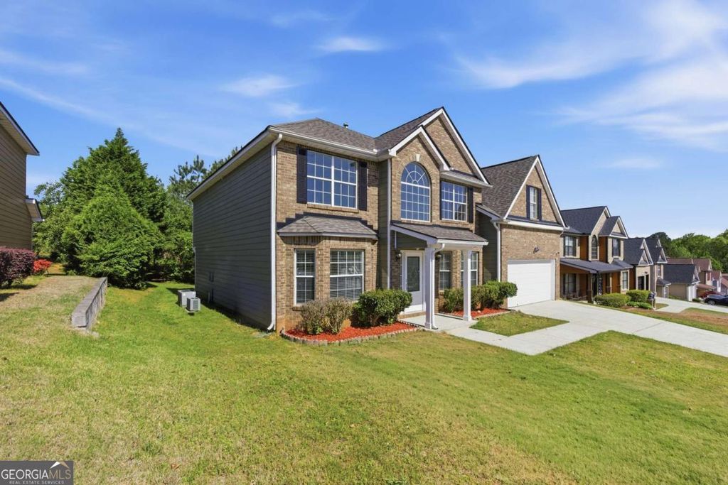 Photo of 1368 Travers Creek Trail, Conyers, GA 30012 (MLS # 10735850)