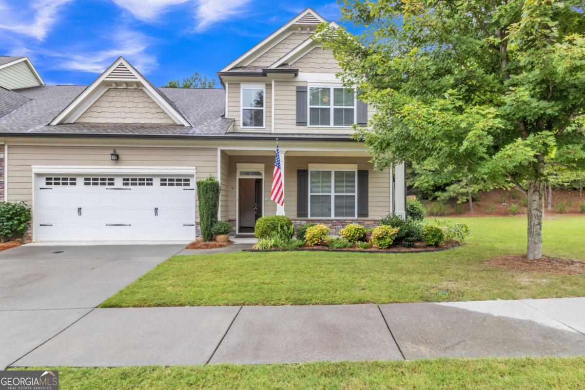 Welcome to River Knoll, Dahlonega's premier 55+ community where an opportunity to own a home is rare! This meticulously maintained, remodeled attached residence offers 4 spacious bedrooms and 3 bathrooms, making it perfect for comfortable living and entertaining. Step through the front door onto stunning hardwood floors and enjoy the airy feel provided by high ceilings throughout. The oversized primary suite features a bath with dual vanities, granite counters, a large tile shower, and a generous walk-in closet. The chef's kitchen is a true showstopper, complete with granite countertops, stainless steel appliances, a 6-burner gas range, ample cabinet space, and a walk-in pantry. Gather with friends and family in the inviting living area by the gas-log fireplace with electric igniter, or relax in the adjacent sunroom while taking in views of your private, fully fenced backyard from the expanded patio. Located on a quiet cul-de-sac and featuring a beautiful garden, this energy-efficient home combines luxury and practicality in a highly sought-after neighborhood. Located a short drive from the Historic Downtown Dahlonega Square, hiking trails, wineries and shopping. This home's location is the perfect springboard to mountain living and lifestyle. Don't miss your chance to join this welcoming community-schedule your private tour today!
