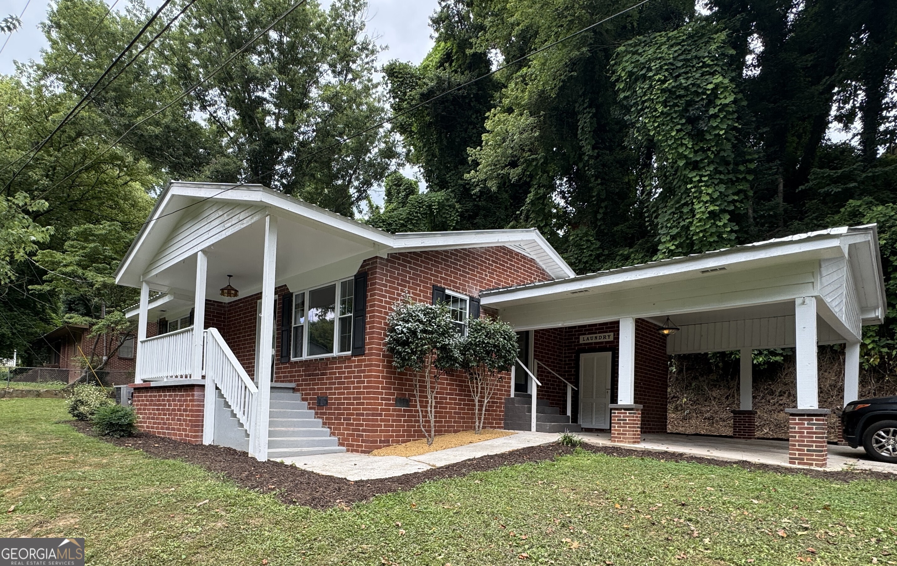 Nestled in a serene neighborhood, this beautiful brick ranch home extends an invitation to comfort and convenience with its spacious layout featuring three bedrooms and two baths, all thoughtfully situated on a single level. Perfectly positioned for those who value proximity, the home is just a short distance from town, benefiting from the advantages of city water and sewer services. Designed with modern tastes in mind, the residence boasts a stylish new tile shower in the master suite, offering a touch of luxury and relaxation. The updated kitchen has brand new appliances and granite counter tops for a chef's delight. Embrace the warmth and charm of this inviting property, where style meets functionality, ensuring a harmonious living experience for the homeowner.