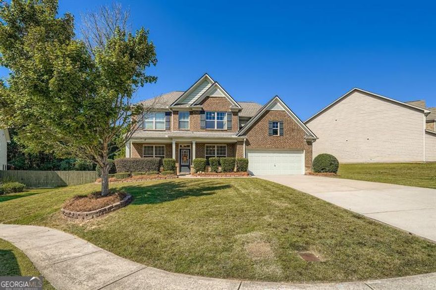 Beautiful home in the sought-after Seckinger High School District! Conveniently located near the Mall of Georgia, this entertainer's dream features a spacious island kitchen with granite countertops, tile backsplash, stainless steel appliances, and an open view to the family room. Upstairs boasts a luxurious master suite with a large walk-in closet. Enjoy great curb appeal, a prime location near shopping and dining, and top-rated schools - this home truly has it all!