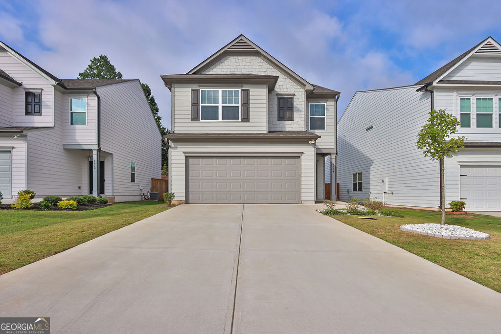 Welcome to this cozy 3 bedroom, 2.5 bathroom home, nestled in a tranquil neighborhood. Brannon Ridge is located in the vibrant South Hall County near Lake Lanier and Flowery Branch. The open-concept living area is filled with natural light and features a large dining area, ideal for gathering with loved ones. The kitchen comes equipped with an island, essential stainless steel appliances, making meal prep a breeze. Enjoy the comfortable, open master bedroom with a walk-in closet. Two-car garage and WHOLE HOUSE WATER FILTRATION SYSTEM. Step outside to a backyard, perfect for enjoying a peaceful morning coffee. Convenient access to Interstate 985, minutes away from shopping and dining in Gainesville, and nearby Lake Lanier is perfect for a weekend with friends and family. Enjoy a prime location near Lake Lanier, I-985, shopping, dining, and entertainment. MOTIVATED SELLER!