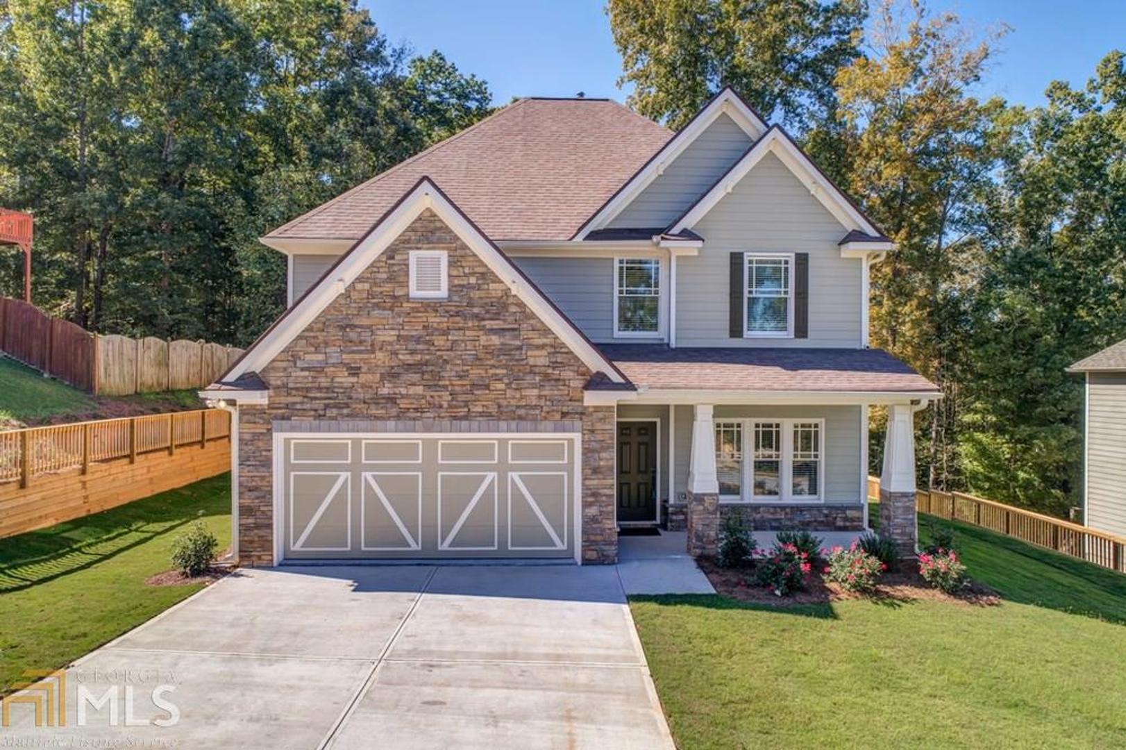 Welcome to this Beautiful, Clean, Spacious Home! 4 Bedrooms, 2.5 Baths Featuring Entry Foyer, Separate Dining Room, Powder Room, Open & Spacious Kitchen with Granite Counters, Large Island, Pantry & Breakfast Area. The 2nd Floor Has 3 Spacious Secondary Bedrooms & Hall Bath with Double Vanity. Large Master Suite with Trey Ceiling. Master Bath with Separate Tub/Shower, Double Vanity & Walk-In Closet. Deck Overlooking Large Private Lot. Energy Star Certified Home. GrayHawk Homes built this home in 2016; The Longleaf floorplan.