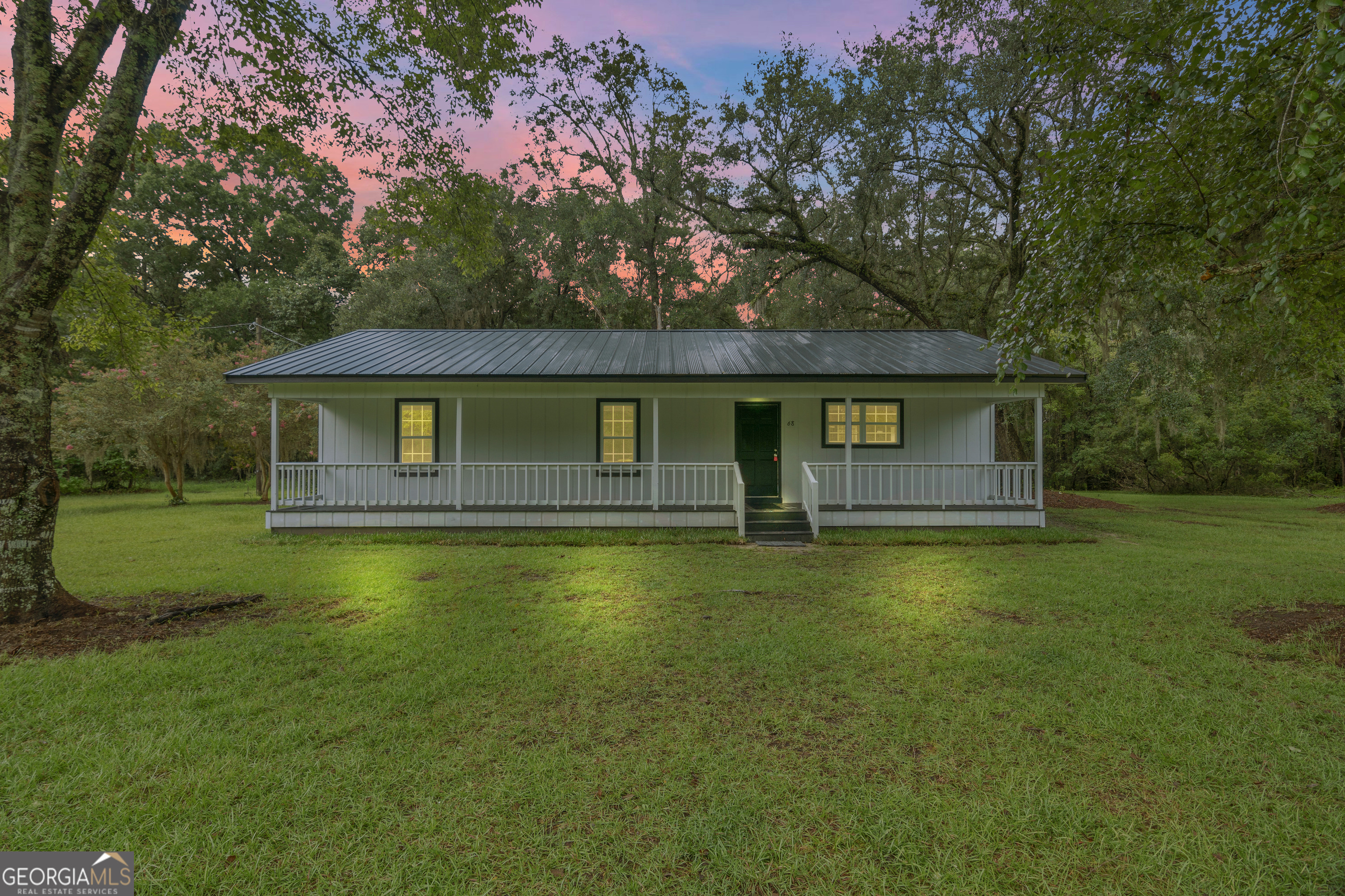 100% FINANCING AVAILABLE!! This beautifully renovated 3-bedroom, 2-bathroom property sits on a sprawling 2.47-acre lot, offering peace, privacy, and plenty of room to roam. Step inside and you'll immediately notice the brand new flooring, fresh interior & exterior paint, and spacious layout designed for functional living. The kitchen flows seamlessly into the dining and living areas, perfect for entertaining or cozy nights in. Each of the large bedrooms offers ample space and natural light, while the updated bathrooms feature clean finishes. Enjoy peace of mind with a brand new roof, new HVAC system, and all-new updates throughout the home - this property is truly move-in ready. Relax and unwind on the expansive front porch, perfect for morning coffee or evening sunsets. Located just minutes from local amenities yet tucked away enough to enjoy the tranquility of country living, this home offers the best of both worlds. Don't miss your chance to own this beautifully updated gem on nearly 2.5 acres. Schedule your private showing today!