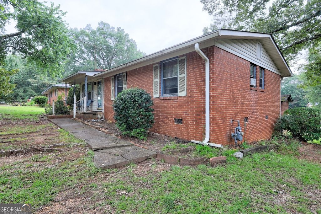 Photo of 5838 Highway 42, Ellenwood, GA 30294 (MLS # 10672338)