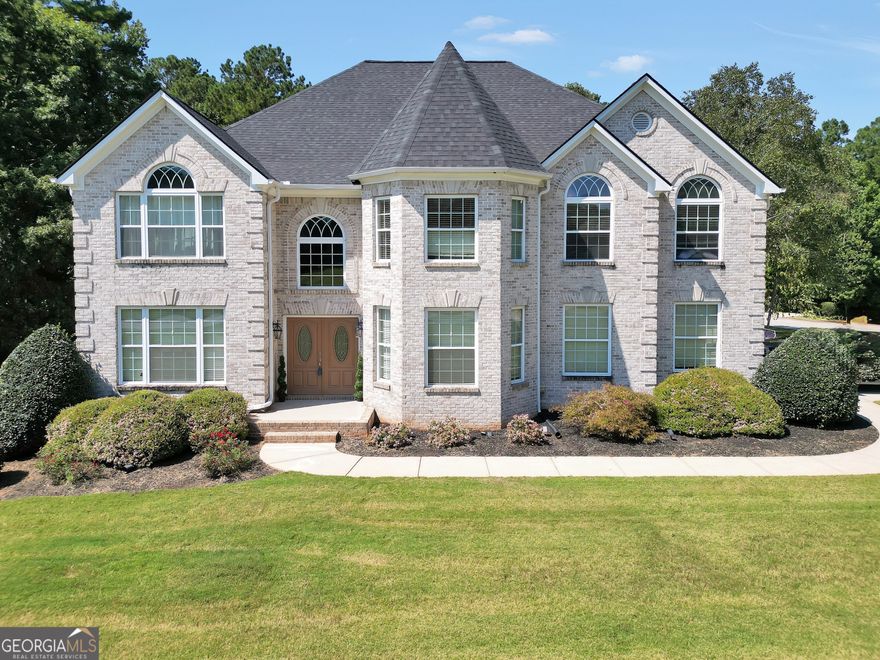Discover this stunning 5-bedroom, 4.5-bathroom home, boasting over 5,000 square feet of beautifully designed living space. Nestled on a spacious lot, this home offers a full basement, multiple bonus rooms, and a layout that seamlessly blends elegance with comfort. The updated kitchen is a chef's dream, featuring modern appliances, sleek countertops, and ample storage. Each bathroom has been thoughtfully renovated with high-end finishes for a spa-like experience. The basement is partially finished with a full bathroom, multiple rooms, and a movie theatre. Step outside to your private oasis, where an inground pool awaits, perfect for summer entertaining. A detached garage offers endless possibilities-it could be transformed into a pool house, man cave, or guest suite. With room to grow and spaces designed for relaxation and entertainment, this home is a rare find. Don't miss your chance to make it yours!