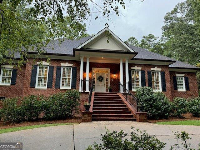 This elegant traditional brick home situated on 2.64 acres in a sought after neighborhood in North Macon exudes beauty and quality craftsmanship. It features top of the line finishes including exquisite wood trim, bullnose brick and soaring high ceilings. This residence is both timeless and refined. The master suite is impressively spacious, offering a generous bedroom, an expansive closet, and a luxurious bathroom. The well appointed kitchen, complete with a breakfast area seamlessly connects to the keeping room creating an ideal space for large gatherings. There is a media room off this kitchen. The dining room will hold your family and friends for the holidays. The lower level boasts two sizable bedrooms each with a private bathroom, and two additional bedrooms that can also serve as a nursery or office. The expansive playroom, complete with a bar, opens onto one of the two charming outdoor back porches perfect for entertaining and relaxation. This home is where many wonderful memories will be made!