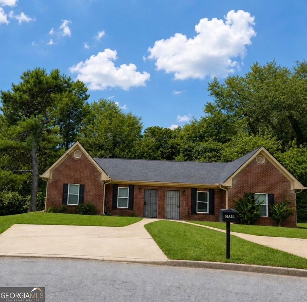 Photo of 310 Freeport Drive, Lawrenceville, GA 30046 (MLS # 10842996)