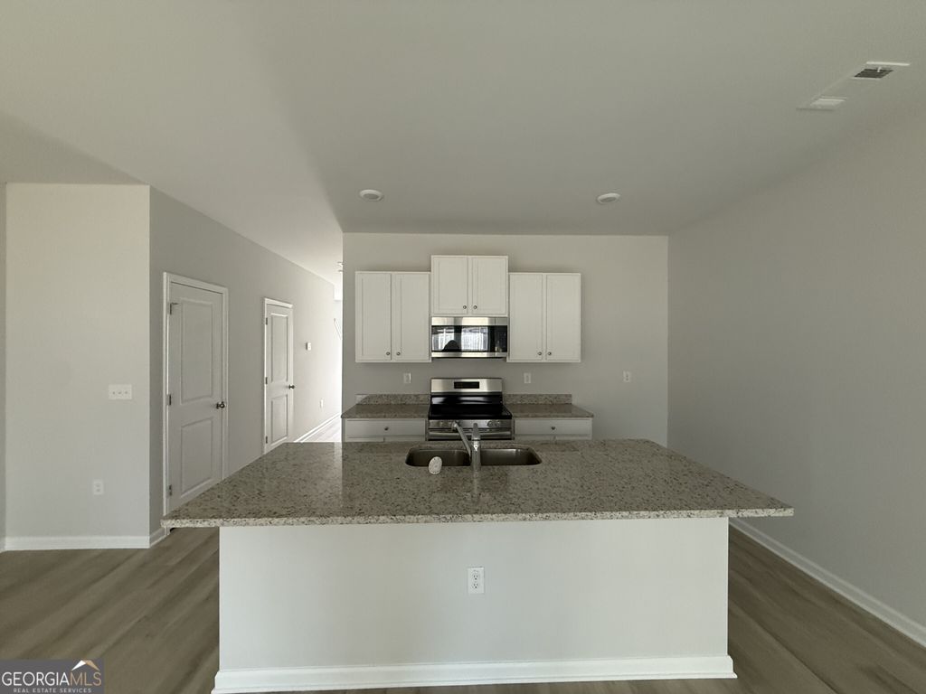 Photo of 156 Village Green Drive, Adairsville, GA 30103 (MLS # 10661025)