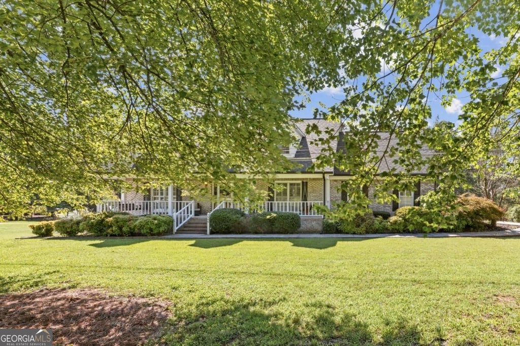 Photo of 3906 Laurens Lane, Snellville, GA 30039 (MLS # 10853280)