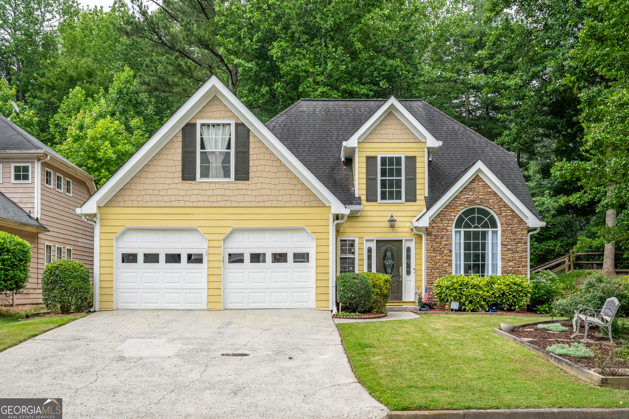 Fabulous opportunity near downtown Alpharetta! Tucked into the serene and conveniently located Henderson Village neighborhood. This beautifully maintained home offers the perfect blend of peace and proximity. Just minutes from Avalon's upscale shops and dining, and a short stroll to the historic charm of Alpharetta City Center, this location puts you at the center of everything-farmer's markets, the Alpha Loop, local parks, and community events. Step inside to a light-filled foyer that opens into a welcoming main level designed for everyday living and effortless entertaining. The open-concept family room, complete with a gas fireplace, flows seamlessly into a bright eat in kitchen featuring a sun room dining area and a kitchen with stainless steel appliances, and a generous counter space. This layout delivers comfort and style, with a master on main, plus a covered/screened patio off of the kitchen. Upstairs, you'll find a huge finished bonus room which includes a closet that can be used as a fourth bedroom or recreational area over the garage, plus two additional bedrooms and a full bathroom. Out back, relax in your fenced landscaped yard with a charming covered patio-perfect for morning coffee, evening wine, or weekend BBQs with friends and pets. Recent updates throughout the home and major systems in excellent condition. This is more than a house-it's a lifestyle. Don't miss your chance to call one of Alpharetta's most desirable locations home.