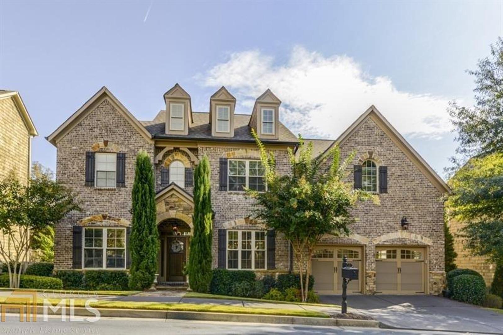 Gorgeous, brick home nestled in the sought-after Meadowbrook located in Jackson school district. Minutes away from Buckhead, Sandy Springs & convenient access to I-285/400/75, walkability to Chastain & restaurants. Two-story entrance foyer leads to living/dining rm & 10' ceilings on main. Bright kitchen w/SS appls, white cabinets, granite counters & island opens to the family rm w/fireplace. French doors lead to private deck. Upper lvl hosts 4 bedrms & 3 full baths. Newly finished terrace lvl has daylight living area w/built-in bar, playroom/gym & au pair suite w/bath.