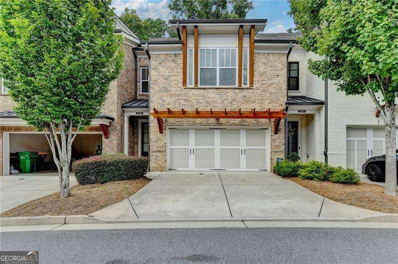 Executive home in a GATED community in sought after Johns Creek. Mins from Emory Johns Creek, Halcyon, Trader Joes. walk across to Kroger, restaurants. 9 mins approx to Avalon. Chattahoochee High School. All of Windward amenities available for a fee. Hard to get backyard, fenced in with woods in back and privacy!!! Walk into the kitchen level and no hauling groceries up!! Open floor plan with an over sized island. Quartz counter tops, stainless steel appliances. Laundry is upstairs with 3 bedrooms and 2 baths. A huge loft/bedroom with a walk in closet and full bath on 3rd level perfect for a large bedroom, play area or rec area. WINDWARD AMENITIES ARE AVAILABLE WITH SWIM/TENNIS & PICKLEBALL.