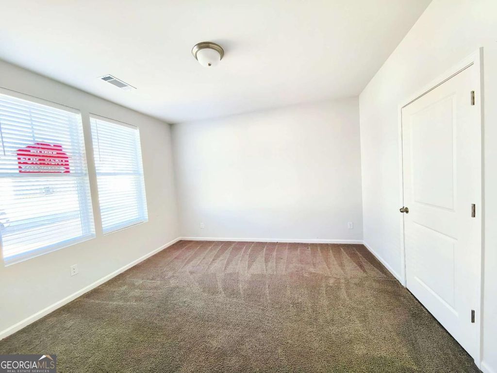 Photo of 2400 Whistler Way NE, Lawrenceville, GA 30043 (MLS # 10701797)