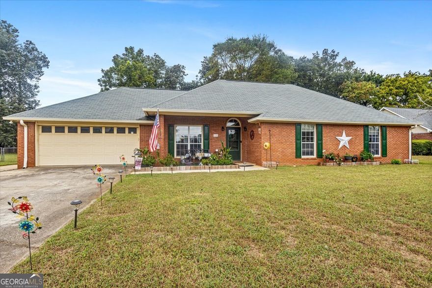 Updated 10/17/25: Seller offering $5,000 in Seller Concessions!    Welcome to Settlers Landing, one of the most convenient neighborhoods in Warner Robins! This all-brick, 3-bedroom, 2-bathroom home offers over 2,080 square feet of living space. Inside, you'll find a spacious sunroom filled with natural light, a separate dining room, solid surface countertops in the kitchen, and a separate laundry room for added functionality. The primary suite features a large bathroom with a separate tub and shower.    The exterior is equally impressive with an extended driveway, covered RV parking, gutters, and a large attached workshop-perfect for projects or additional storage. Enjoy outdoor living in the fenced-in backyard complete with an above-ground pool, ideal for summer fun and relaxation. The HVAC system has been regularly serviced, most recently in August 2025, giving you peace of mind for years to come.    Centrally located right off Feagin Mill Road, this property puts you close to shopping, dining, schools, and all the conveniences Warner Robins has to offer. Don't miss your opportunity to call Settlers Landing home!