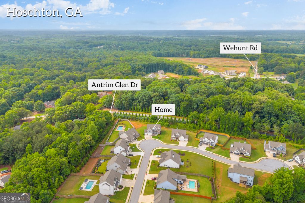 Photo of 305 Parkers Pl, Hoschton, GA 30548 (MLS # 10772755)