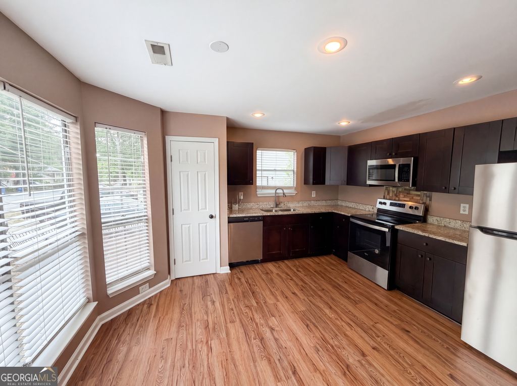 Photo of 7020 Greenbower Lane, South Fulton, GA 30349 (MLS # 10742137)