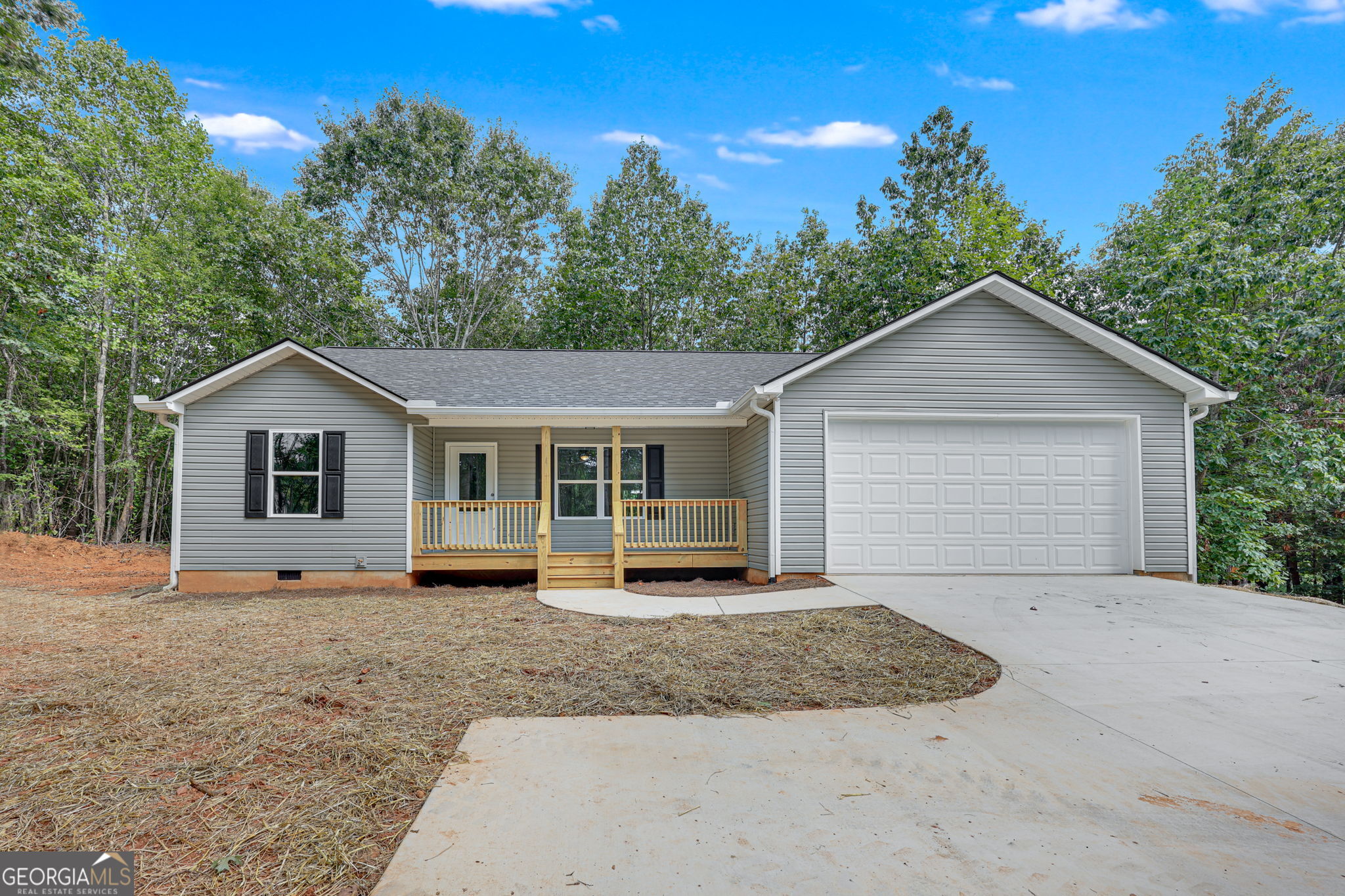 $5,000 Seller Paid Closing Cost! The Durham Plan - 3 Bedroom/2 Full Bathrooms home in the City of Mt. Airy, Georgia. The subdivision is conveniently accessible to I-985/365, Shopping, & Restaurants! Homes offers an Open Concept Living/Dining/Kitchen. Spacious Owner has en-suite Owner Bathroom and Walk-In Master Closet, Carpet in all Bedrooms. 2 Car Garage with automatic opener, Stainless Appliance Package, Granite in Kitchen, & MORE! This home offers GREAT outdoor living with a back patio plus large .52 acre lot!