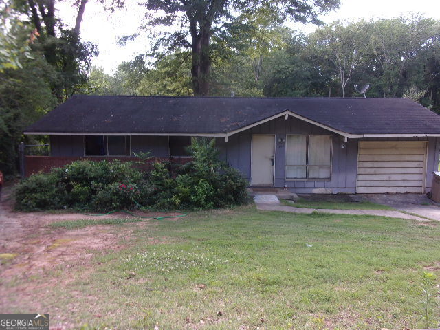 Opportunity knocks! This 3-bedroom, 1.5-bathroom ranch-style home in Forest Park is packed with potential and waiting for the right investor or handy buyer to bring it back to life. Features: Spacious layout with bonus room - perfect for office, den, or 4th bedroom Parking pad for off-street convenience Located near highways, shopping, and public transportation Minutes to I-75, I-285, and Southlake Mall Needs some TLC - ideal for investors, flippers, or DIY buyers looking to add value and equity. Priced to sell - don't miss your chance to grab this diamond in the rough! solid rental or resale potential in a convenient location.