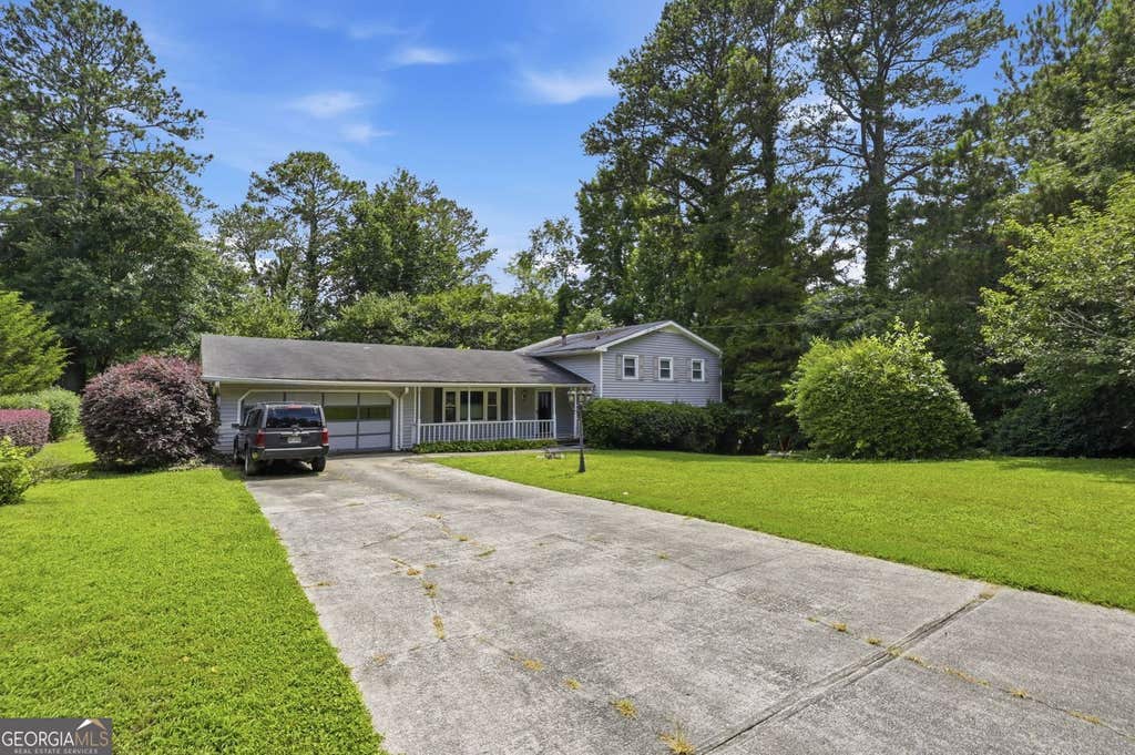 Photo of 4118 Rocky Ledge Way, Snellville, GA 30039 (MLS # 10786983)