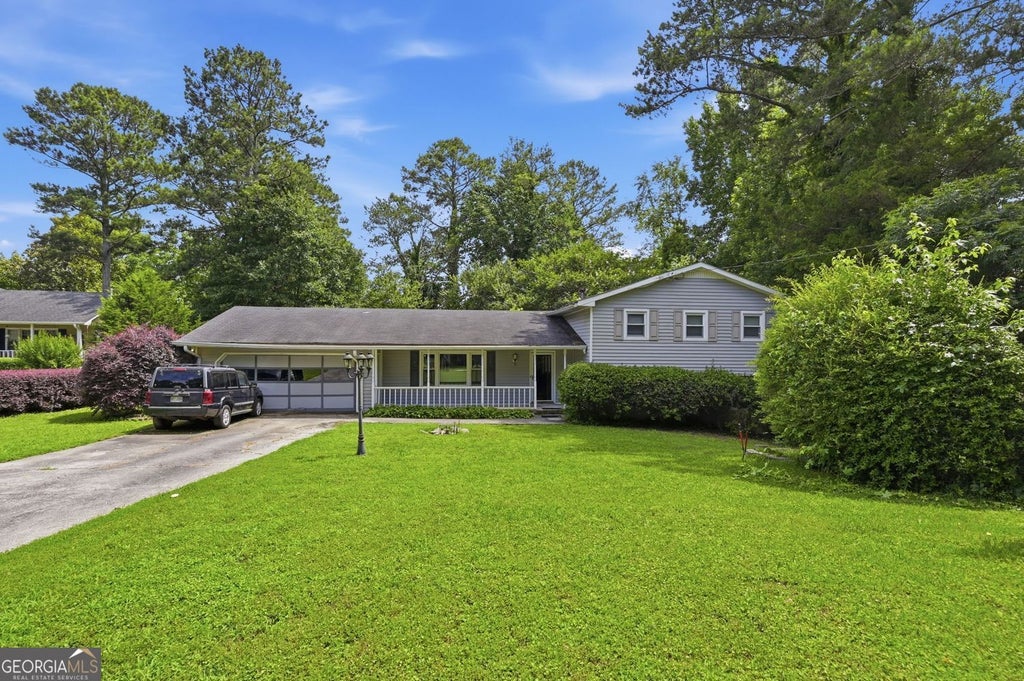 Photo of 4118 Rocky Ledge Way, Snellville, GA 30039 (MLS # 10786983)