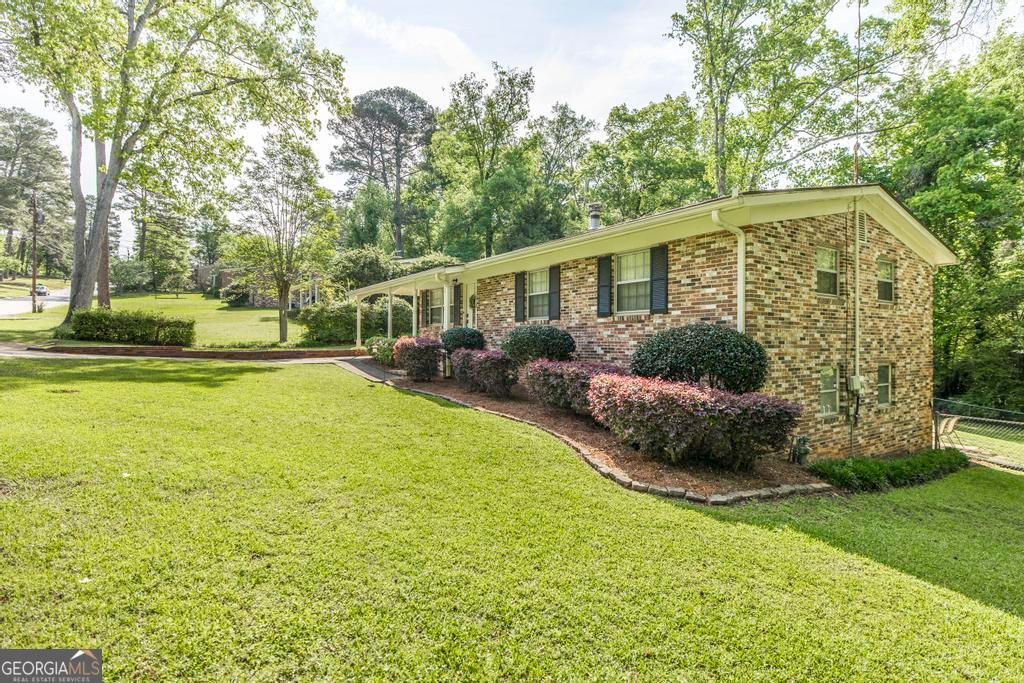 Photo of 4260 Wood Forest Place, Macon, GA 31210 (MLS # 10733713)