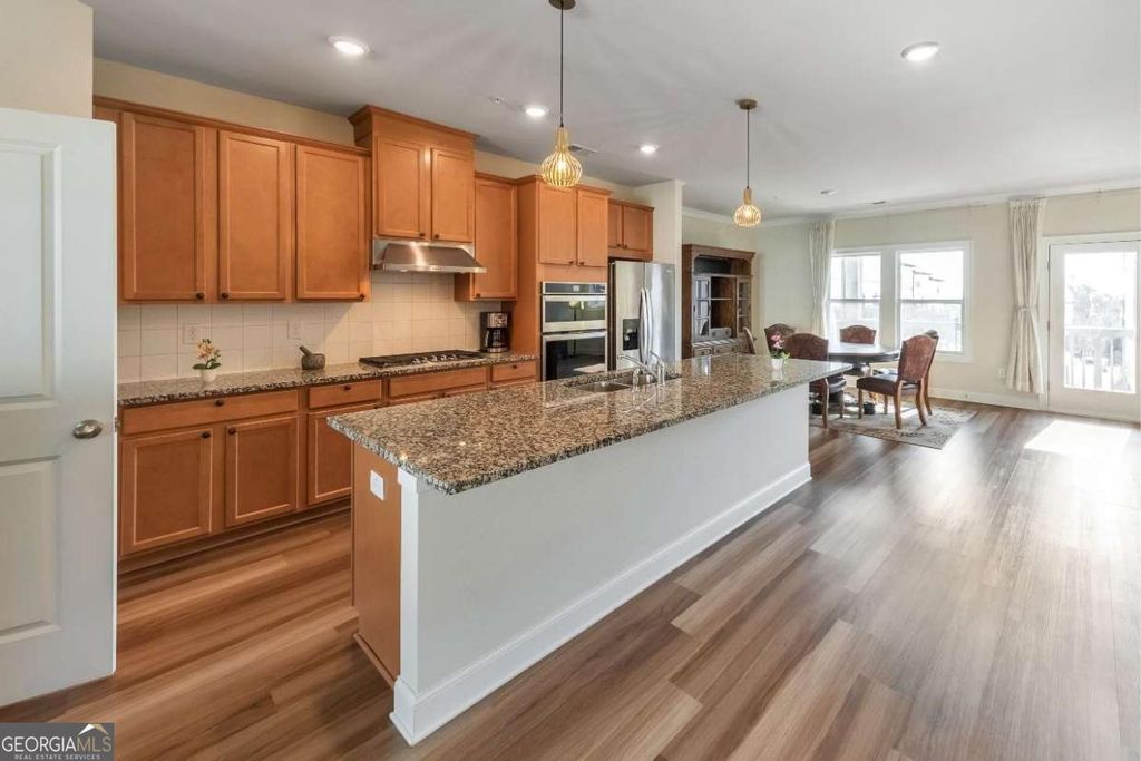 Photo of 823 Mackay Creek, Woodstock, GA 30188 (MLS # 10689540)