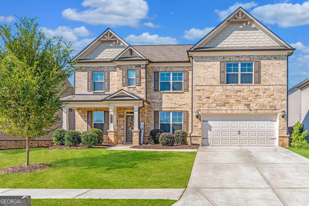 NEW PRICE ----NEW OPPORTUNITY | 2.625% ASSUMABLE RATE --- Central Park Luxury in the Heart of Gwinnett County!!!! Welcome home to this beautifully appointed 5-bedroom, 3-bath residence in the sought-after Central Park community-where modern design meets everyday comfort. With its generous layout, stylish upgrades, and private outdoor retreat, this home is perfectly crafted for both entertaining and unwinding. The open main level immediately impresses with gleaming hardwood floors, soaring natural light, and a seamless flow between living and dining spaces. A formal dining room sets the stage for celebrations, while the expansive family room with coffered ceilings adds warmth and sophistication. At the heart of it all, the chef's kitchen features custom gray cabinetry, stainless steel appliances, and an oversized island with breakfast bar-perfect for gatherings large or small. Also on the main floor, a spacious bedroom and full bath offer the flexibility of a guest suite, home office, or gym. Upstairs, a versatile loft creates endless opportunities for a playroom, media lounge, or home library. Retreat to the primary suite, where a private sitting area and spa-inspired bath with soaking tub, glass shower, dual vanities, and a walk-in closet provide the ultimate in comfort. Three additional bedrooms share a full bath, ensuring space for family and guests alike. Step outside to enjoy a covered patio overlooking the fenced backyard-your own private oasis for al fresco dining, quiet evenings, or lively celebrations. Ideally located minutes from Loganville Town Centre, boutique shopping, dining, parks, and scenic trails, this home pairs luxury with convenience in one of Gwinnett County's most coveted neighborhoods. Don't miss this opportunity-schedule your private showing today and experience Central Park living at its finest, now offered at a NEW PRICE!