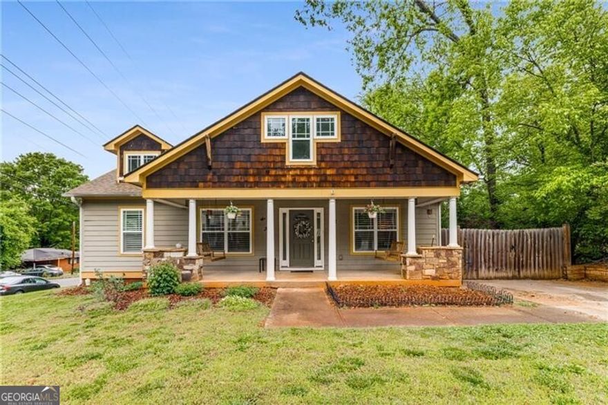 This charming craftsman bungalow built in 2007, in historic Marietta, less than a mile from Marietta Square. This home has a large private, fenced-in backyard that includes a screened-in porch and a separate outdoor patio area.  There is a large primary bedroom with an en-suite bathroom and 2 other bedrooms with another full bathroom in the hall. The kitchen is open to the dining room as well as the family room. The family room is spacious with an abundance of natural light. This home is located 2 blocks from Henry Park, Emily Lembeck Early learning center, and is very close to Marietta Square and the Marietta Square Market. The roof was replaced in 2023 and the hvac, and water heater were replaced in 2025! No showings after 6:45pm.