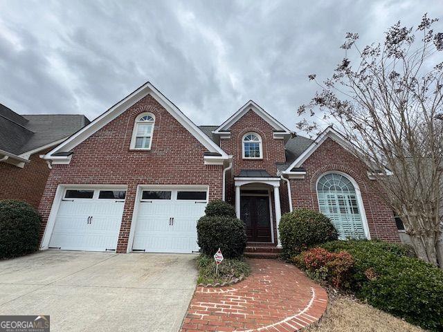 Wonderful home on a beautiful water lot in East Cobb. Walton High School. Terrace level has kitchen, rec room, bath. Home has all hardwood floors. It's really a beautiful home! Never any pets or smokers. Master on main.
