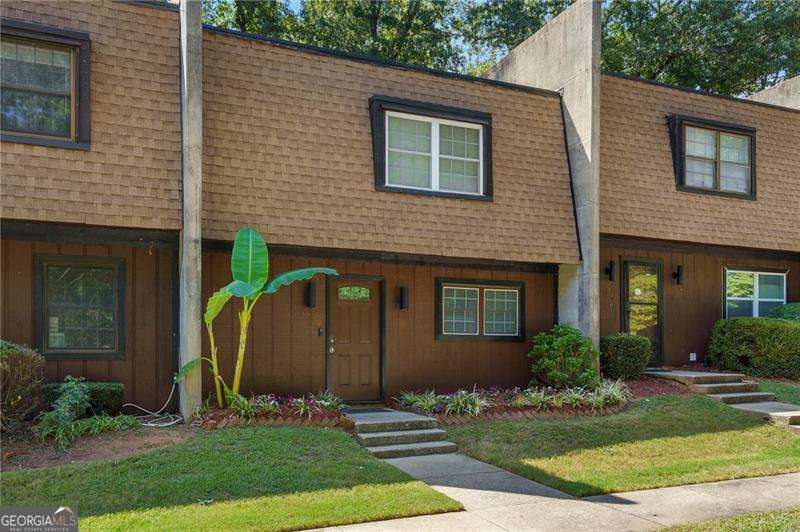 The Location you are looking for! Close to Marietta Square, Kennesaw State University, Life University highways and entertainment. Perfect as an investment property or fist home. Truly a gem that has been perfectly maintained. Property boast tons of upgrades! Newer roof , HVAC, Paint. Very spacious as well. Not to mention includes a jacuzzi and sunroom. you do not want to miss out on this one! Convenient one step entry no stairs and parking right in front of the home. The space was recently beautifully updated with lovely flooring throughout offering a modern living space with a cozy open living room. No Rental Restrictions.