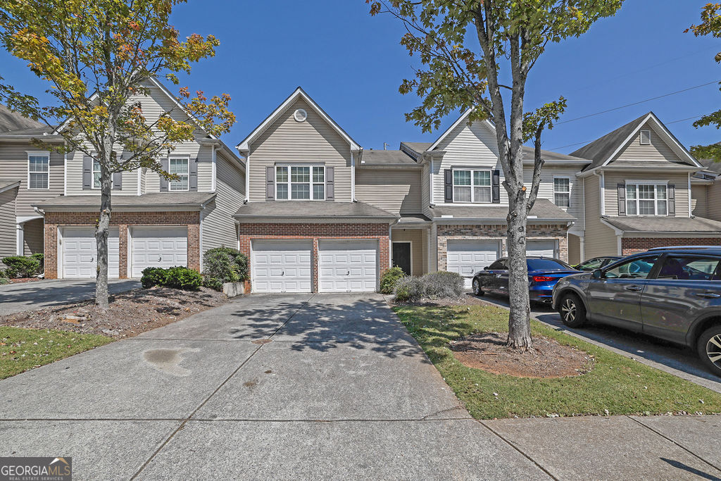 Beautiful 3-Bedroom Townhome in Prime Location - Close to KSU! Don't miss this move-in ready 3 bedroom, 2.5 bathroom townhouse located just minutes from Kennesaw State University. This home features gorgeous hardwood-style floors on the main level and plenty of natural light throughout. Recent updates include a new AC, new HVAC system, and a new hot water heater for peace of mind. Upstairs, the seller is offering a $5,000 flooring allowance, making it easy to customize the space to your style. Enjoy a fantastic location in one of the area's hottest markets-homes here don't last long! Convenient to shopping, dining, and major highways. Make this one yours today before it's gone!