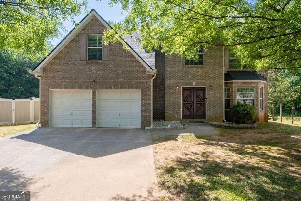 Photo of 385 Kentwood Springs Drive, Hampton, GA 30228 (MLS # 10740863)