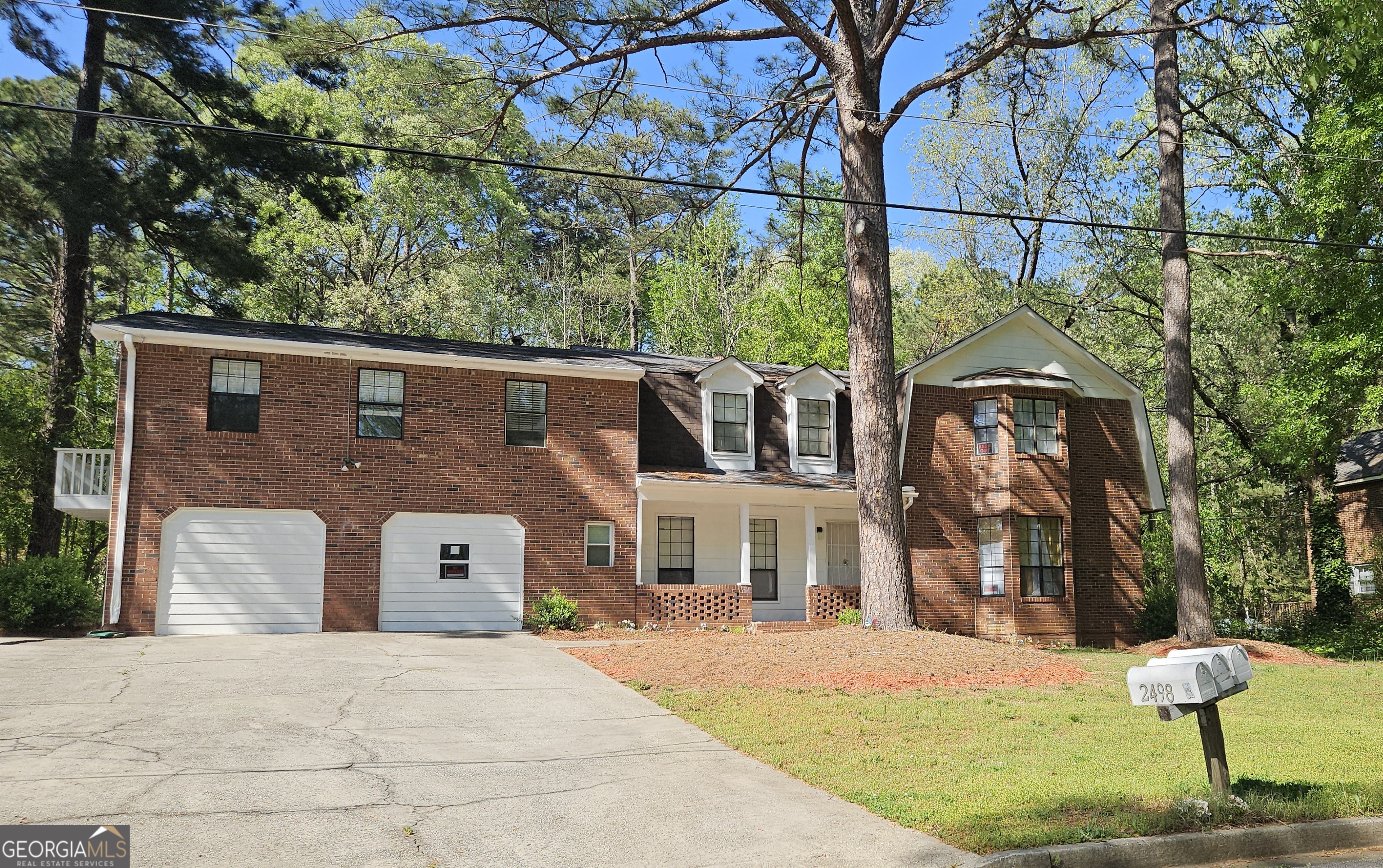 Live Smart & Invest Wisely in Ellenwood - Beautiful Renovated Triplex! Nestled in a peaceful, established neighborhood with no HOA, this beautifully updated triplex in Ellenwood is a true gem for savvy homeowners and investors alike. Offering over 3500+ square feet, this property blends charm, function, and income potential. Unit 1 (1BR/1BA - Occupied): Cozy and bright with a galley kitchen, formal dining, living space, and full bath upstairs. Long-term tenant in place. Units 2 & 3 (2BR/2.5BA - Vacant): Spacious layouts with fireplaces, formal dining, galley kitchens, and guest half baths on the main floor. Upstairs, each bedroom has its own private full bathroom. Bonus: The property includes two enclosed garages, each with a rear door-perfect for storage, hobbies, creative workspace, or even potential income-producing conversion. You'll love the modern finishes, private decks, newer systems, and unbeatable location close to shops, parks, schools, and major highways. Additional photos will be added