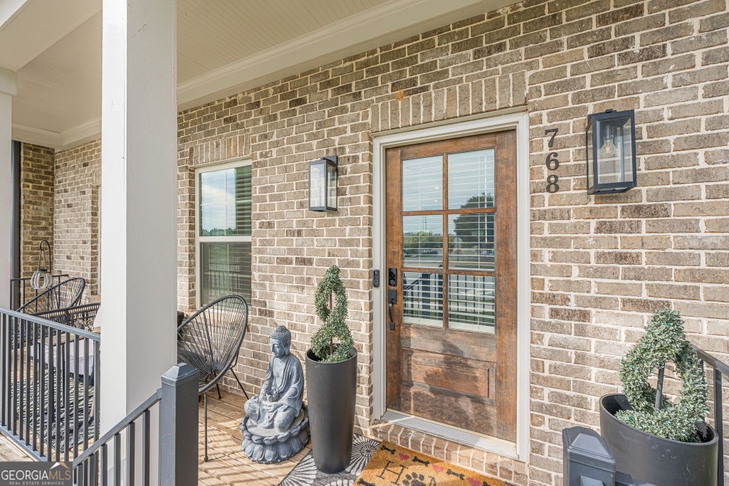 Photo of 768 Honey Bee Lane, Lawrenceville, GA 30046 (MLS # 10869758)
