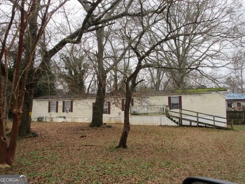 Photo of 54 Skyland Drive W, Locust Grove, GA 30248 (MLS # 10676140)