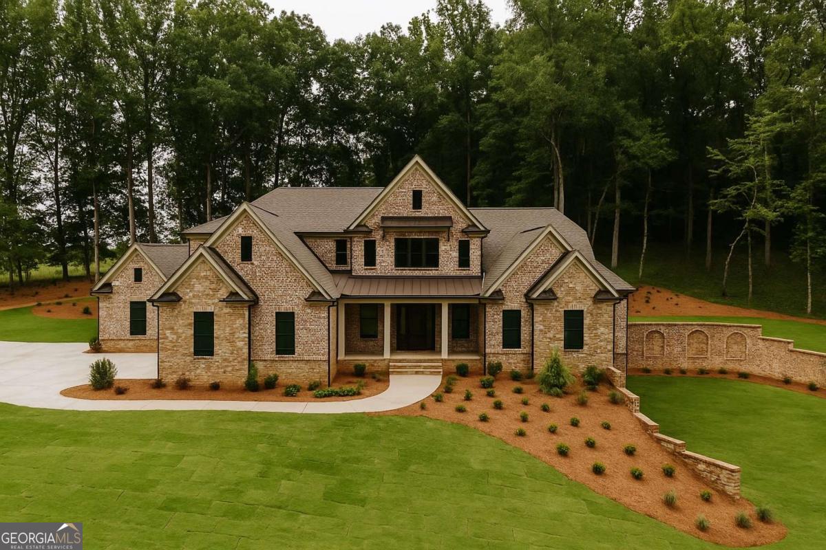 Welcome to your dream home in the exclusive gated horse community of Saddle Shoals. This custom-built brick home is an exquisite, private retreat set on four pristine acres. As you enter the home, you will be greeted by the grandeur of the main level incorporating fine craftsmanship, meticulously curated design elements, like rich, hardwood floors and intricate moldings that produce a classic, enduring style throughout. This home features five spacious bedrooms, including a luxurious primary suite and a secondary bedroom on the main level. The floor plan seamlessly connects the keeping room, breakfast area, family room, and stunning kitchen. With custom cabinets, a large center island, walk-in pantry, and a suite of premium appliances, the kitchen is truly the center of this amazing home. Step out onto the covered porch and take in the beautiful views of your own private pool and endless outdoor entertaining spaces. The primary suite is a true sanctuary, boasting a lavish bathroom with a large walk-in closet and breathtaking tilework. Upstairs, youll find two additional, spacious bedrooms and bathrooms plus a grand bonus space that could also serve as a third bedroom. There is ample storage space throughout the home as well as an elevator for ease. The finished basement is a home unto itself, featuring a great room with a fireplace, a recreational room with a second fireplace, media room, poker room, and a guest suite with full bath. There is an attached, three-car garage and an additional, detached three-car garage featuring a finished 1200 square foot guest house above. This area includes two bedrooms, two and a half bathrooms, a family room, full kitchen, dining, and stunning views of the four acre property. Saddle Shoals offers private gated entrances, a riding rink, horse trails, and man other amenities, making it the perfect setting for equestrian enthusiasts. Dont miss this amazing opportunity to own a custom home in beautiful horse country, just minutes from Athens, Georgia.