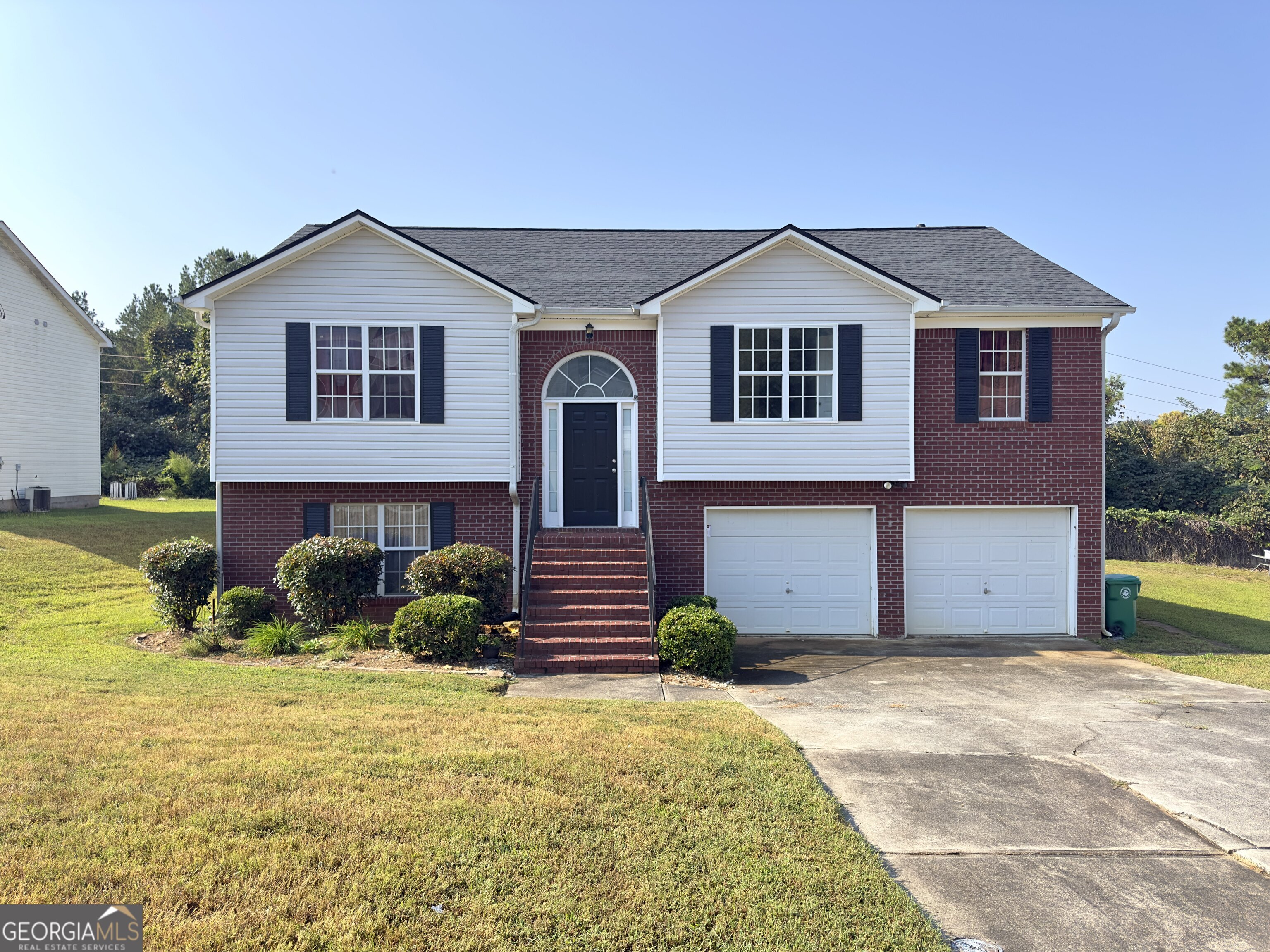 Welcome to 4527 Berline Drive! This beautifully updated 5-bedroom, 3-bath home in the quiet Belfair subdivision of Lithonia offers over 2,400 sq. ft. of living space on a generous 0.4-acre lot. With a brand-new roof, a newly built deck, and a recently serviced HVAC, this home is move-in ready. Step inside to find a spacious floor plan perfect for modern living. The expansive master suite features a walk-in closet and a spa-like ensuite with double vanities. Additional bedrooms and flexible living areas provide ample space for family, guests, or a home office. Relax or entertain with ease on the brand-new deck overlooking the private backyard, complete with a peaceful sitting area ideal for enjoying Georgia's seasons. This home truly combines space, style, and comfort in a prime location - and to top it off, the seller is including a home warranty!