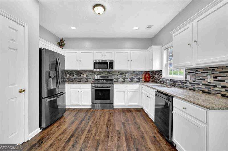 Photo of 1208 Everwood Drive SW, Marietta, GA 30008 (MLS # 10802889)