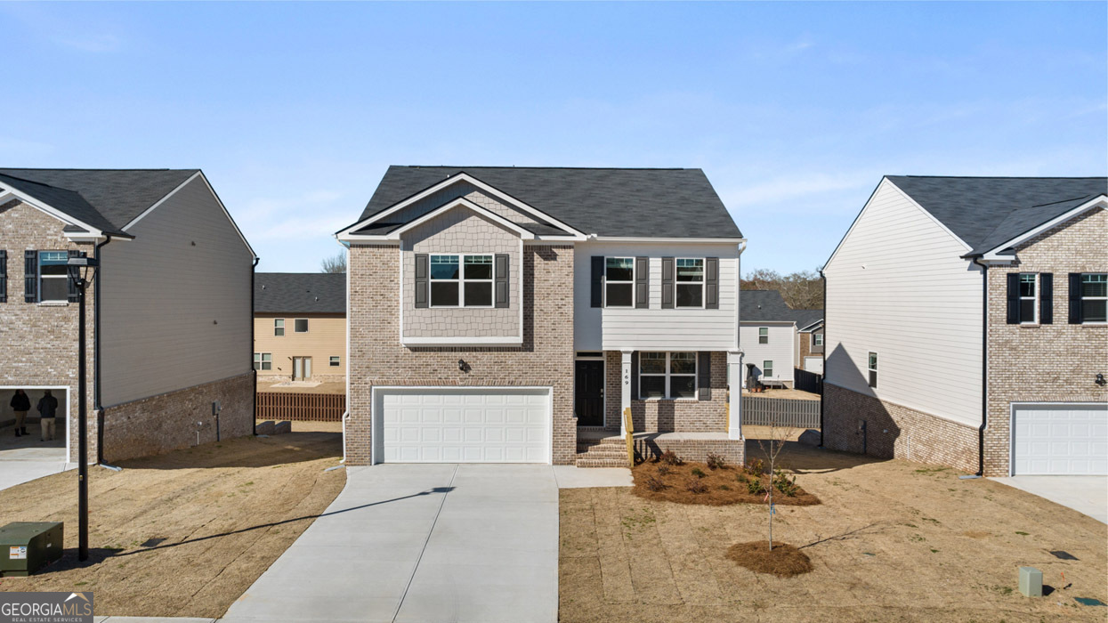 CLOSING COST PAID and special financing with Preferred Lender! Residents will also enjoy POOL, CABANA WITH GRILLING STATION, PLAYGROUND, WALKING TRAILS and DOG PARK! MINUTES FROM I-75 AND I-675. The "PENWELL FLOOR PLAN" is a two-story home offering 2,205 sq. ft. of living space across 4 bedrooms and 2 full bathrooms plus a powder room. Open the door to a flex room that you can make your own. Create a dedicated home office, formal dining room for hosting or an additional living area. An island kitchen with bar top seating includes granite countertops, modern cabinetry and stainless steel appliances. The kitchen flows into a casual breakfast area and beyond into the spacious family room so everyone stays connected. Plus, there is a convenient powder room on the main level. Upstairs includes a large primary bedroom suite with expansive spa-like bath with shower, garden tub, dual vanities and generous closet space. Three secondary bedrooms provide a space for everyone plus a convenient laundry complete this classic design. And you will never be too far from home with Home Is Connected. Your new home is built with an industry leading suite of smart home products that keep you connected with the people and place you value most. Photos used for illustrative purposes and may not depict actual home.