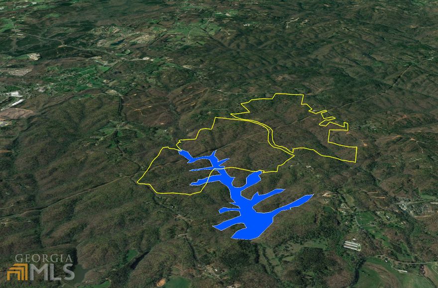 ESTATE-OWNED! Unique investment opportunity to acquire large compartment of contiguous land positioned directly in the path of high growth. Etowah Water & Sewer Authority in process of developing a US Army Corps of Engineers approximately 145 acre reservoir lake that will bisect southern half of the property. Less than 4 miles from exploding retail growth located at GA 400 and the North Georgia Premium Outlet Malls. Over 2 miles of total road frontage on three public roads including State Hwy 136. This tract is predominantly old natural hardwood stands with two major creek systems that feed the Etowah River. Numerous open grassed areas throughout with incredible long-range views. Multiple homesites. Excellent interior woods road system. Abundant Wildlife managed for hunting. Property is the whole tract of smaller parcels being offered in MLS #'s 20001664, 20002163, 20002170.