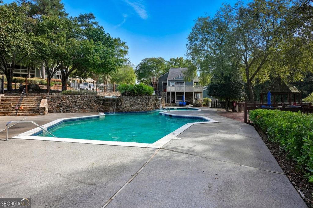 Photo of 4636 Vinings Central Run SE #130, Atlanta, GA 30339 (MLS # 10717734)