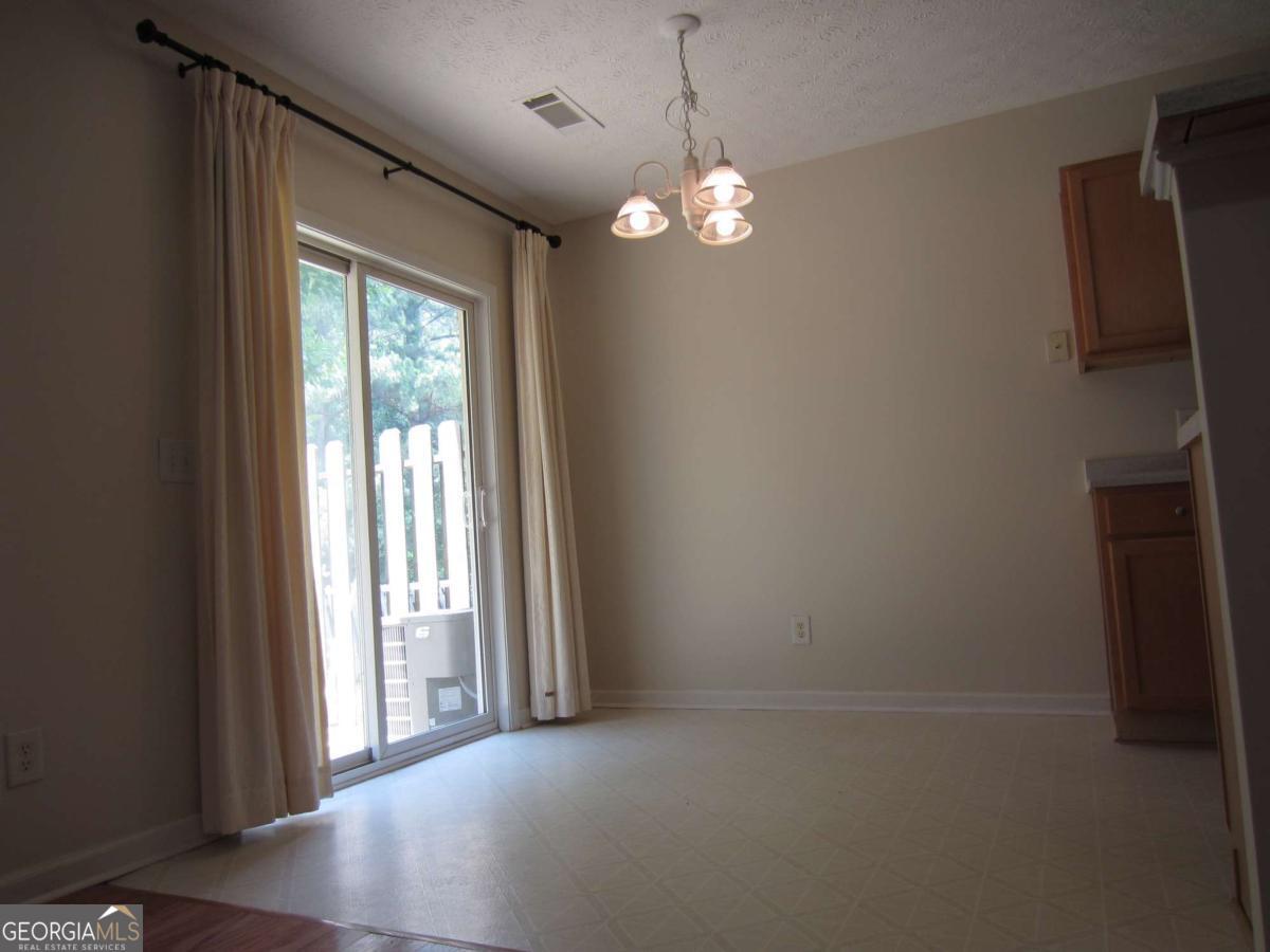 Parkview High School District! Spacious and well maintained 2003 townhouse has 3 bedrooms, 2.5 bath rooms. Hardwood floor on main. Formal family room with fireplace. New HVAC in 2021, Bright kitchen and dining room face private back yard. Close to Emory, CDC. Hwy 85, 78. Washer and dryer on site. Small Pets allowed, breeds restricted, pet rent and fee applied. Available on 6/1. This won't last long!