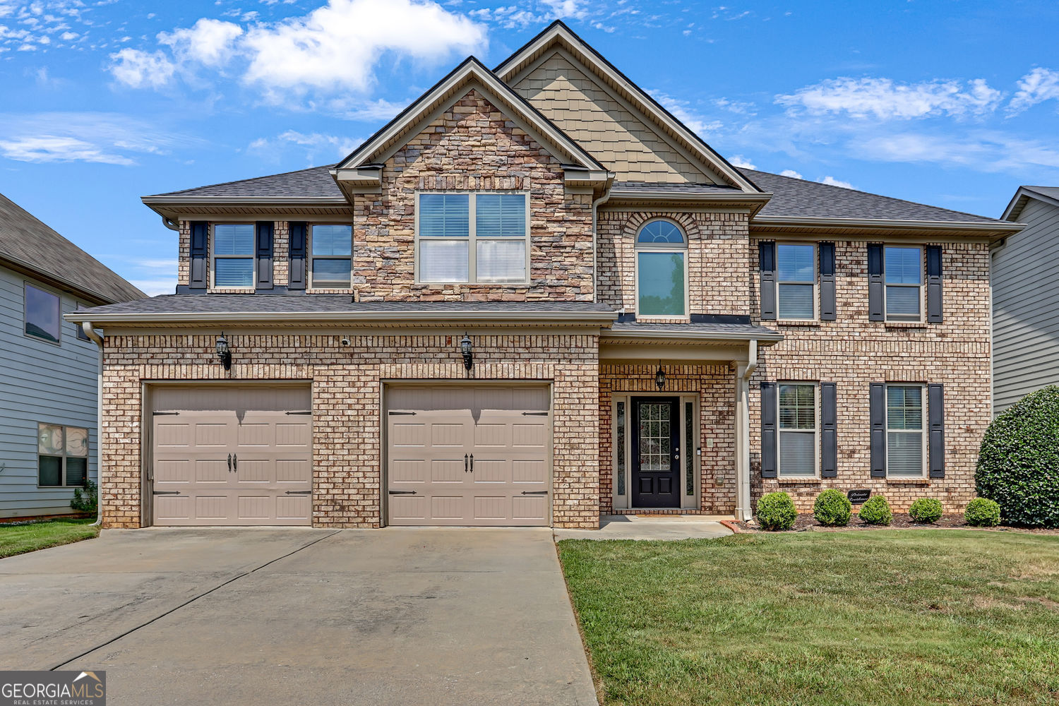 Priced to sell! This spacious 5-bedroom, 3.5-bath home in Snellville's desirable Meadow Wind community offers plenty of room to grow. The main level features a bright, open layout with formal dining, a large living room, and a family-friendly kitchen with abundant cabinetry and counter space. Upstairs, the oversized primary suite includes a private bath with double vanities, soaking tub, and separate shower. Four additional bedrooms and two full baths provide flexible space for guests, home offices, or playrooms. Roof was replaced last year. Enjoy the backyard, perfect for pets, play, or entertaining outdoors. A two-car garage and level lot add everyday convenience. Close to shopping, dining, schools, and parks, with easy access to Hwy 78 and Scenic Highway, this home blends comfort, location, and value.