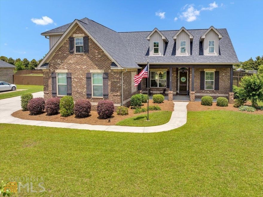 Yearning to live in Perry? Now is your chance! Situated in one of Perry's most sought-after neighborhoods, Stonegate, this beautiful brick home boasts a charming rocking chair front porch, fireside living room and an abundance of natural light.  The kitchen features stainless steel appliances, beautiful countertops, and an ample cabinet space.  Enjoy the view from the breakfast nook into the beautiful private backyard!