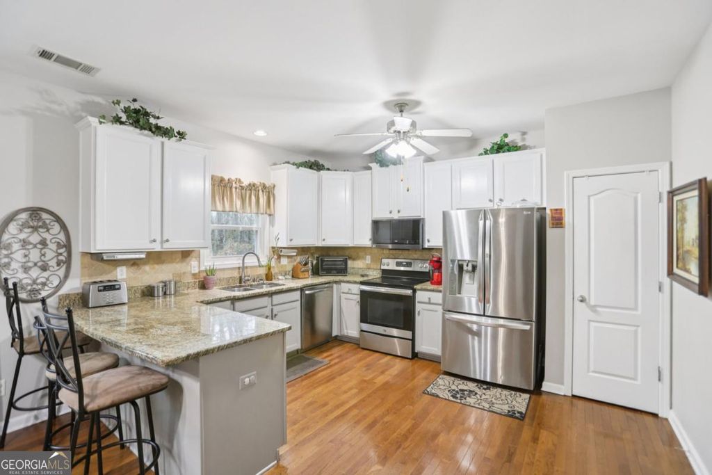 Photo of 419 Long Shore Way, Newnan, GA 30265 (MLS # 10654572)